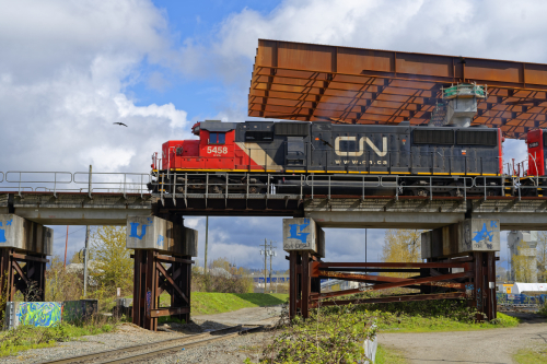 CN Rail Hauling Ramp up over bridge