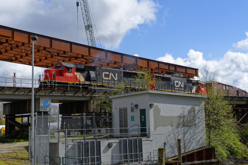 CN Rail Hauling Ramp up over bridge